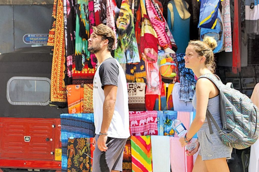 Tourism Industry | Tourists shopping in Sri Lankan markets